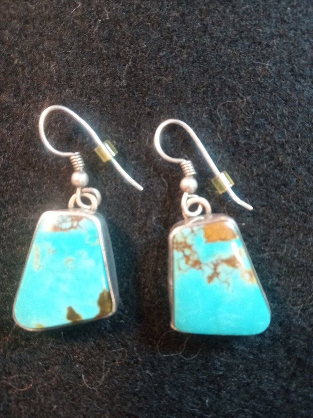 Native American made Kingman turquoise & silver earrings by Lester Ortiz.